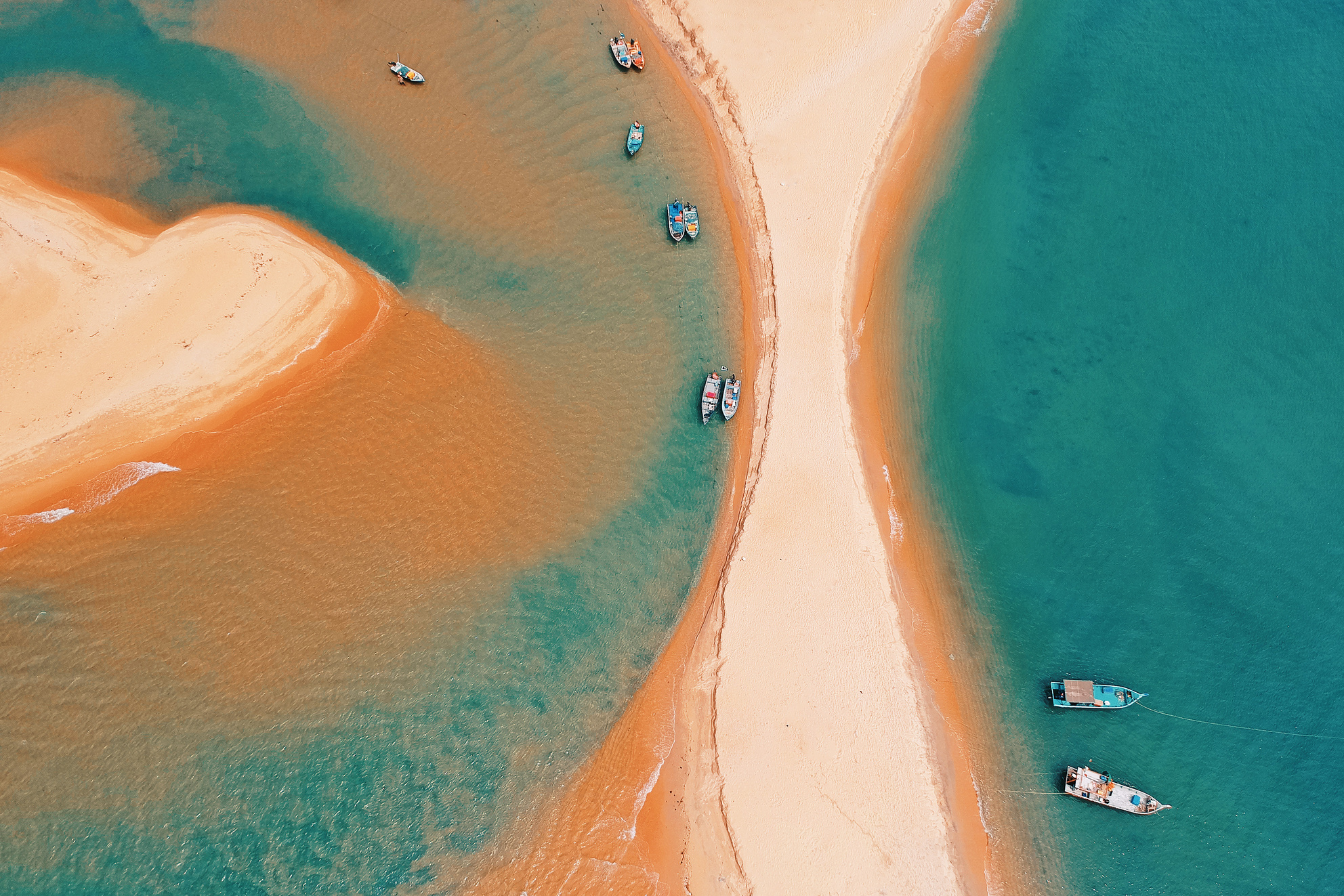 Aerial Photo Of Boats On Body Of Water